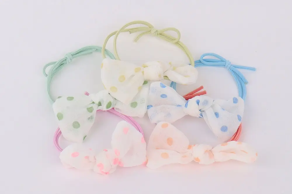 colitas con moño.webp