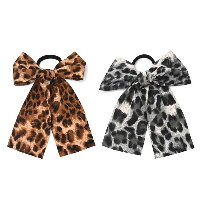 GOMITA MOÑO CON LAZO TELA ANIMAL PRINT  X1U (UNIDAD)