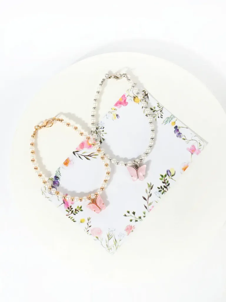 SET PULSERAS PERLAS MARIPOSA CAREY