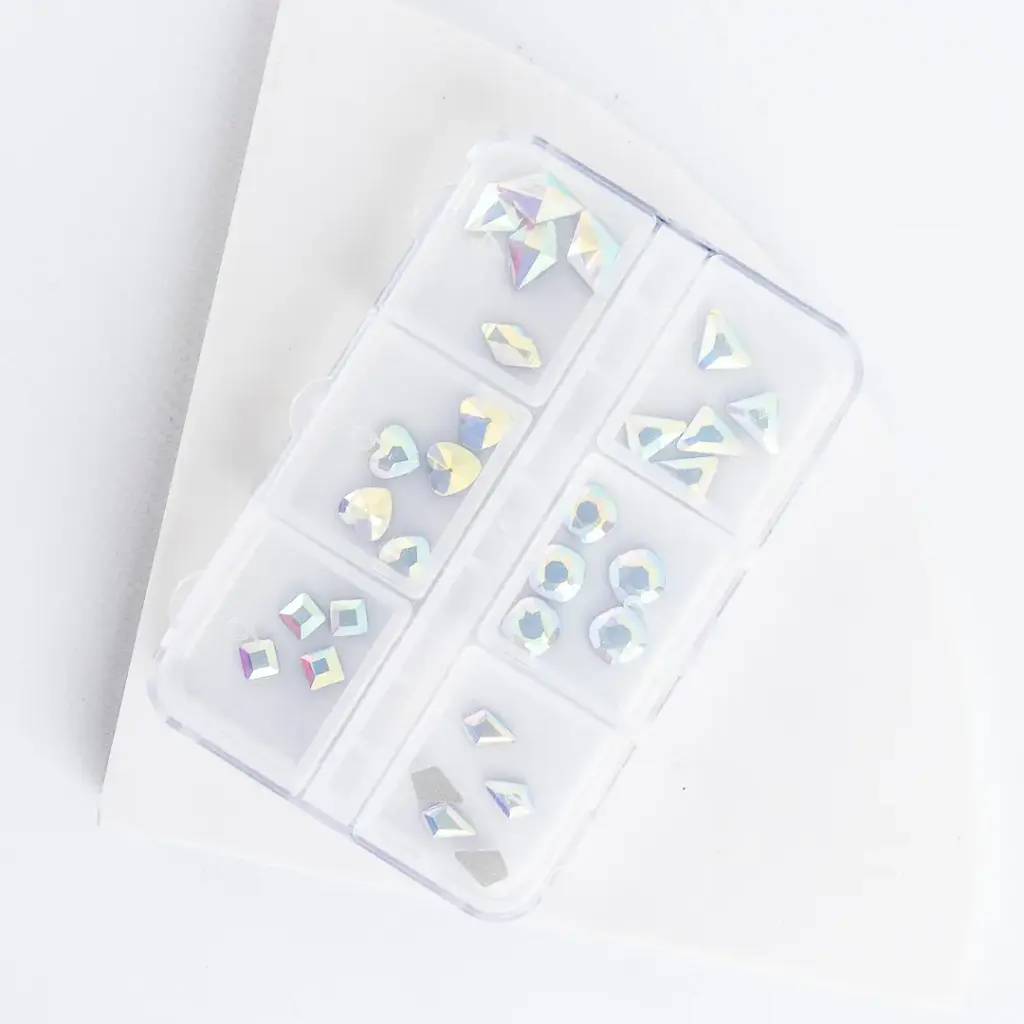 ACCESORIOS PARA UÑAS CRISTALES CITY GIRL  (12 UND - BOLSA)