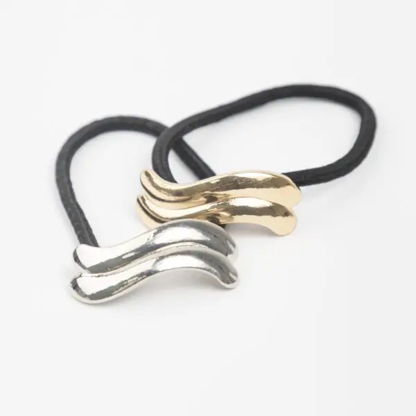 COLITA PONY CUFF lineas acero