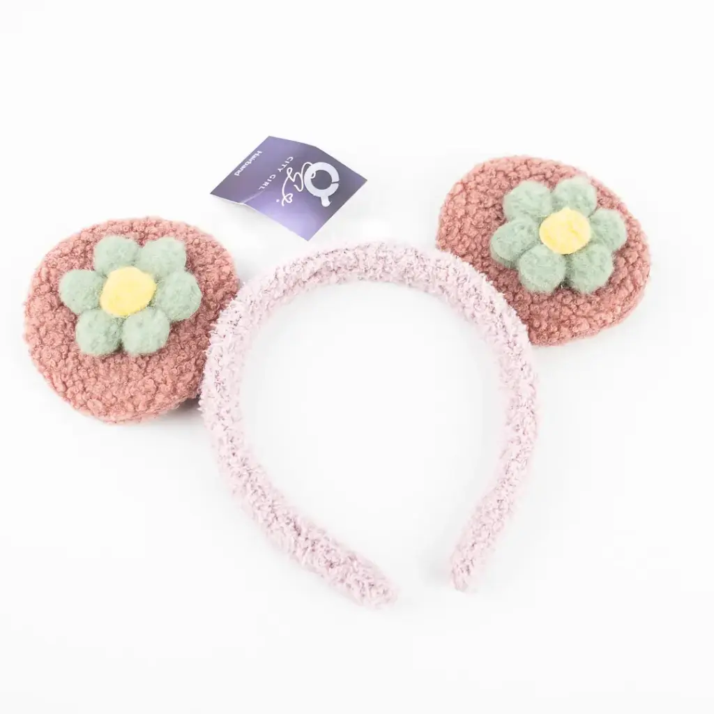 VINCHA CON OREJA DE FLOR (VARIOS COLORES)